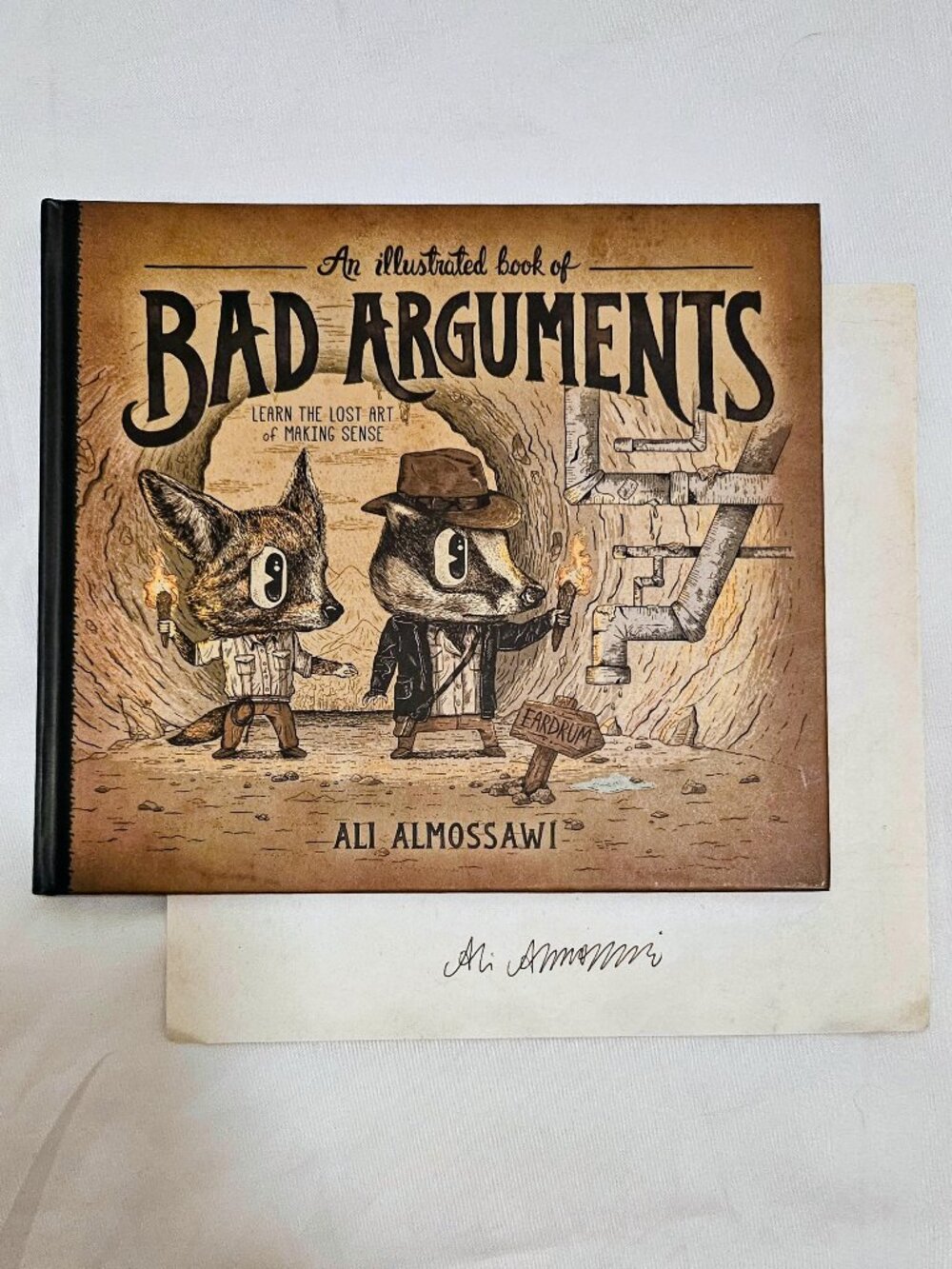 Autographed "An Illustrated Book of Bad Arguments" by Ali Almossawi